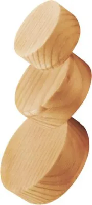 A stack of three wooden discs, balanced on top of each other.