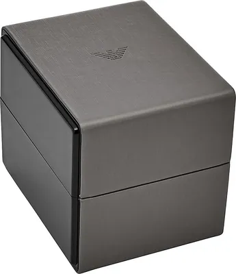 A close-up of a dark grey watch box with the Emporio Armani logo embossed on the lid.