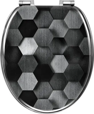A toilet seat lid with a hexagonal pattern.