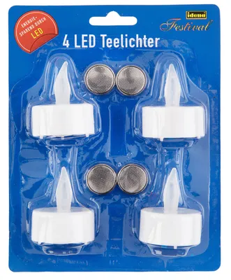 A retail package containing four LED tealights and two button cell batteries.