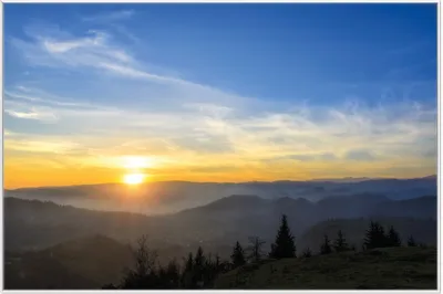Produktbild von Wallario Wandbild Sonnenaufgang über dem Schwarzwald, Größe: 61 x 91,50 cm, Poster mit weißem Aluminiumrahmen