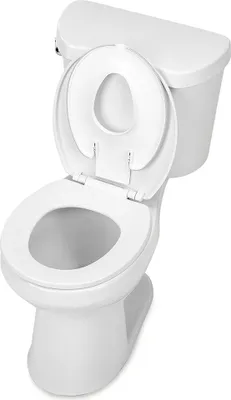 Produktbild von INGENUITY Flip & Sit Toilettenverkleinerer. Klebebefestigung an der Toilettenschüssel.