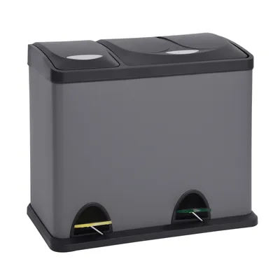 A gray and black dual-compartment trash can with foot pedals.