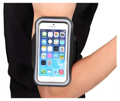 A person wearing a black shirt is shown with a smartphone in an armband on their left arm.