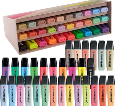 A display of STABILO BOSS highlighters in a cardboard holder, with additional highlighters arranged in front.