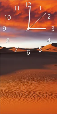 Produktbild von Wallario Design Wanduhr bedruckt, Größe 30 x 60 cm, Motiv: Sahara Wüste II - Sanddünen im Sonnenuntergang
