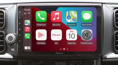A car's dashboard with a Pioneer infotainment system displaying Apple CarPlay.