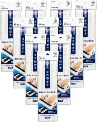 Multiple packages of sushi rolling mats arranged in a grid.