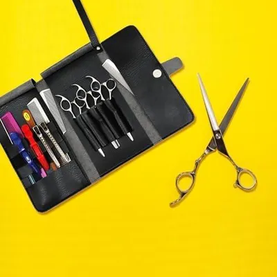 Produktbild von Schwarze Ledertasche für Haarscheren, Clips und Kämme, leicht zu tragen und für den Salongebrauch geeignet