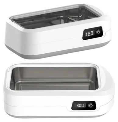 Two ultrasonic cleaners are shown from a slightly elevated angle against a white background.