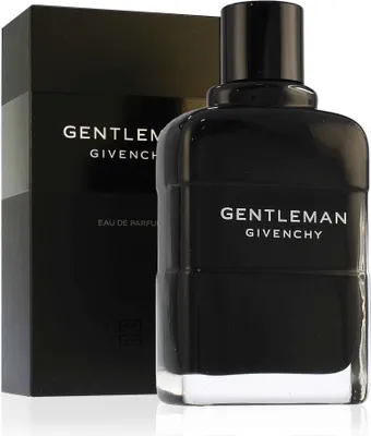 A black bottle of Givenchy Gentleman Eau de Parfum and its matching black box are displayed on a white background.