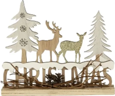 Ein weihnachtliches Holzdekorationsstück, das einen winterlichen Wald mit zwei Hirschen darstellt.