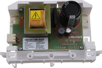 A close-up view of an electronic control board with various components, mounted in a white plastic housing.