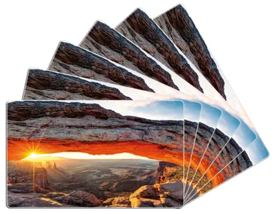 Produktbild von Wallario Frühstücksbrettchen 6er Set aus Glas, je 14 x 23 cm, mit rutschfesten Füßen, Motiv Sonnenstrahl am Horizont  Leuchtende Felsspalte