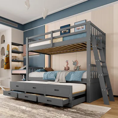 A grey bunk bed with a pull-out trundle bed and drawers, set up in a child's bedroom.