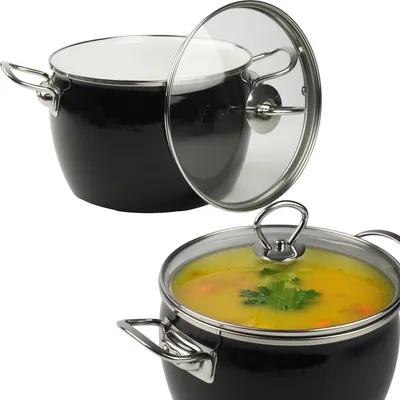 Two views of a black pot with a glass lid, one empty and one filled with soup.