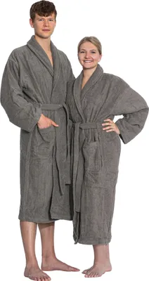 A man and a woman are standing side-by-side, both wearing grey bathrobes.