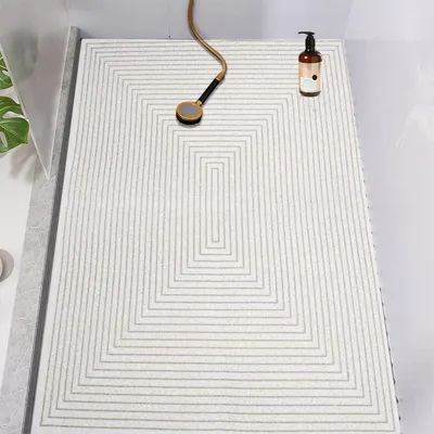 Obrázok produktu pre Protišmyková podložka pod sprchu z PVC s textúrou podobnou ľufy, rozmer 60 x 120 cm, s prísavkami a odtokovými otvormi