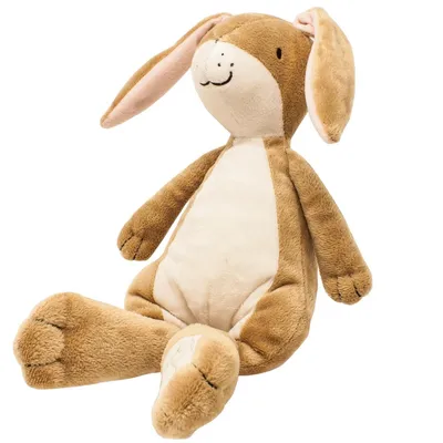 A plush toy rabbit is sitting on a white background.