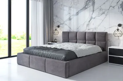 A modern bedroom with a large bed, marble walls, and large windows.