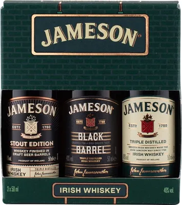A gift set of three small Jameson Irish Whiskey bottles in a green box.
