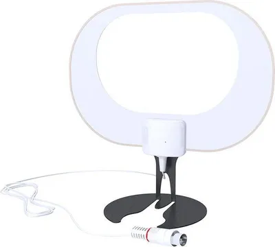 A white oval antenna with a black base and a white cable with a connector.