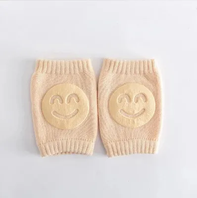 Produktbild von Go Go Gadget – Knieschoner – Baby – Krabbeln – Babysicherheit – Kniestrümpfe – Smiley – 1 Paar – Pfirsich