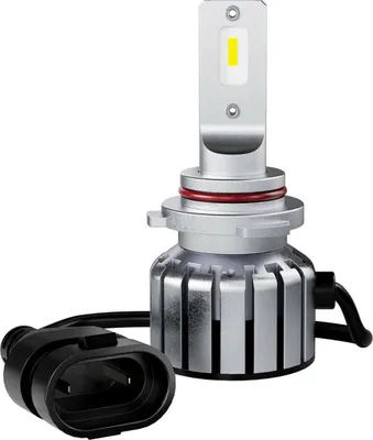 A single LED headlight bulb with its connector.