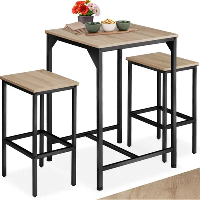 A three-piece bar set consisting of a table and two stools, with decorative items on the table.