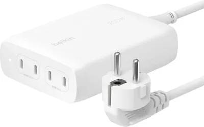 A white Belkin power adapter with two outlets and a European plug.