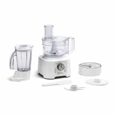 A white food processor with various attachments is displayed against a white background.