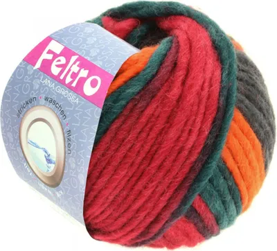 A ball of multi-colored yarn with a label.