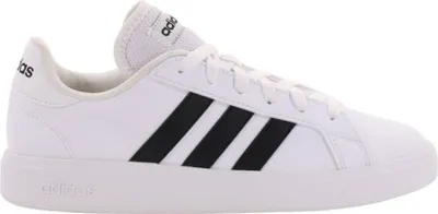 A white Adidas sneaker with black stripes is shown from the side against a white background.