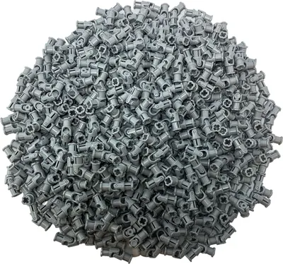 A pile of small, gray LEGO Technic universal joints.