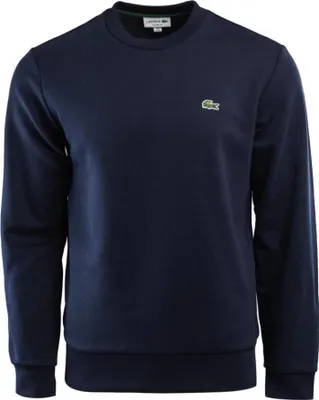 A navy blue Lacoste sweatshirt is shown front and center against a white background.