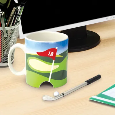 Image de Tasse de golf avec balle et club servant de stylo