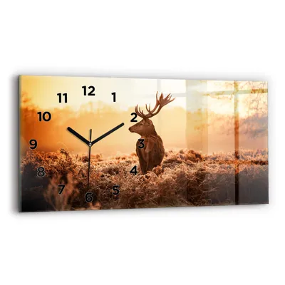 Produktbild von Wallfluent Wanduhr – Stilles Quarzuhrwerk - Uhr Dekoration Wohnzimmer Schlafzimmer Küche - Zifferblatt - schwarze Zeiger - 60x30 cm - Hirsch bei Sonnenaufgang