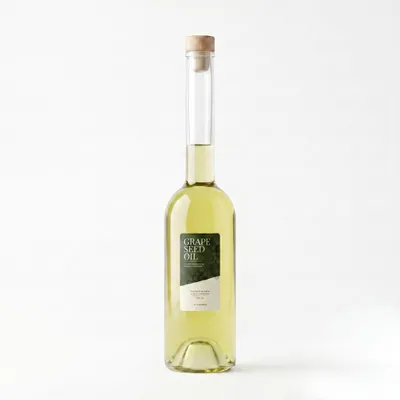 Productafbeelding van TheWootz Snijplankolie – 200 ml Glasfles – 100% Druivenpitolie – Snijplank Olie voor Houten Snijplanken, Hakblokken en Borrelplanken