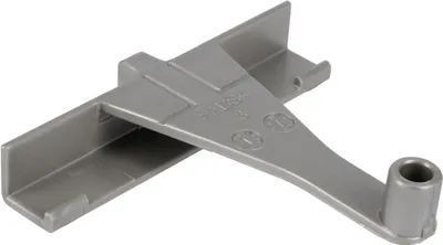 A close-up of a gray plastic component, possibly a part for a household appliance.