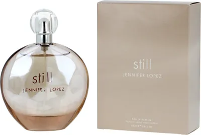 A perfume bottle and its box are displayed side-by-side against a white background.