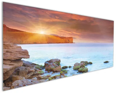 Produktbild von Wallario Küchenrückwand aus Glas, Größe: 125 x 50 cm, Motiv: Sonnenaufgang am Meer mit Landzunge und Felsen im Wasser | Spritzschutz | abwischbar | pflegeleicht | in