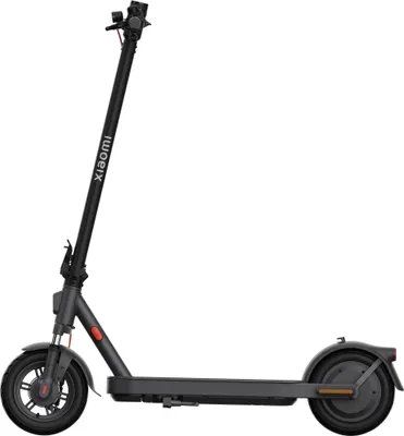 A side view of a black electric scooter against a white background.