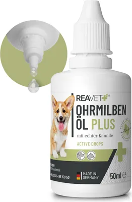 A bottle of ear mite oil for dogs with a close-up of the dropper tip.