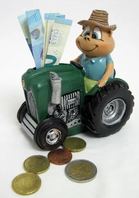 Produktbild von Spardose Mann auf Traktor Nostalgie, mehrfarbig, ca. 12 cm hoch