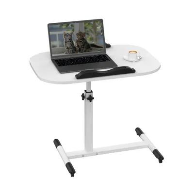 A white adjustable laptop table with a laptop, a cup of coffee, and a wrist rest on it, set against a white background.