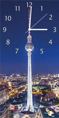 Produktbild von Wallario Design Wanduhr bedruckt, Größe 30 x 60 cm, Motiv: Fernsehturm Berlin bei Nacht