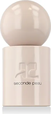 A close-up studio shot of a perfume bottle.