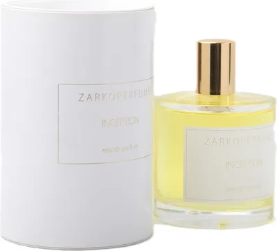 A perfume bottle and its packaging are displayed against a white background.