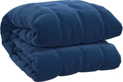 A folded blue weighted blanket.