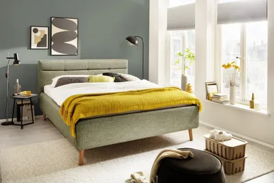 Produktbild von Meise Möbel Stauraumbett Lotte 180x200 cm | Bettkasten & Lattenrost | Webstoff Grün | Holzfuß eichefarbig